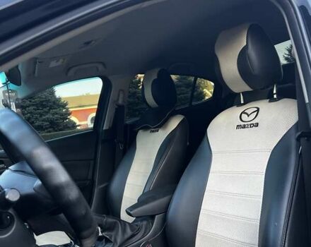 Чорний Мазда 3, об'ємом двигуна 2 л та пробігом 147 тис. км за 10299 $, фото 8 на Automoto.ua