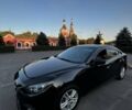 Чорний Мазда 3, об'ємом двигуна 2 л та пробігом 147 тис. км за 10299 $, фото 4 на Automoto.ua