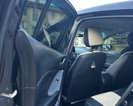 Чорний Мазда 3, об'ємом двигуна 2 л та пробігом 147 тис. км за 10299 $, фото 12 на Automoto.ua