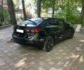 Чорний Мазда 3, об'ємом двигуна 2 л та пробігом 215 тис. км за 9849 $, фото 13 на Automoto.ua