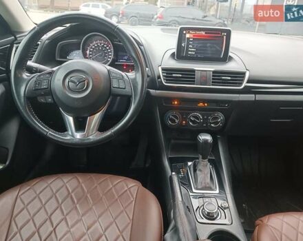 Черный Мазда 3, объемом двигателя 2 л и пробегом 128 тыс. км за 12700 $, фото 16 на Automoto.ua