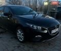 Черный Мазда 3, объемом двигателя 2 л и пробегом 165 тыс. км за 11000 $, фото 1 на Automoto.ua
