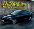 Черный Мазда 3, объемом двигателя 2 л и пробегом 155 тыс. км за 11499 $, фото 1 на Automoto.ua