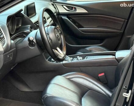 Чорний Мазда 3, об'ємом двигуна 2 л та пробігом 107 тис. км за 13290 $, фото 15 на Automoto.ua