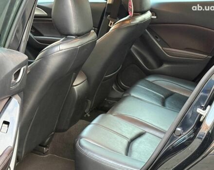 Чорний Мазда 3, об'ємом двигуна 2 л та пробігом 107 тис. км за 13290 $, фото 18 на Automoto.ua