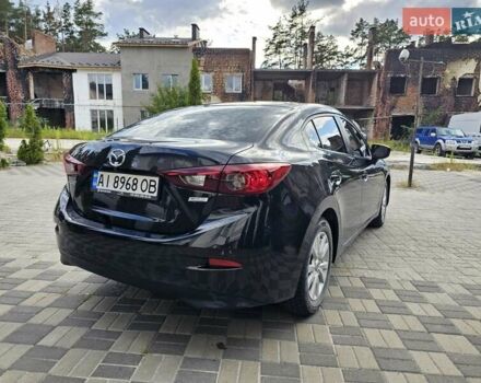 Черный Мазда 3, объемом двигателя 2 л и пробегом 75 тыс. км за 13500 $, фото 3 на Automoto.ua