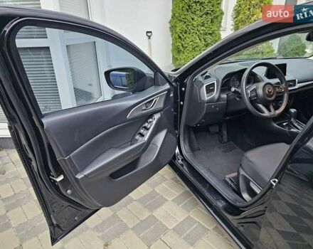 Черный Мазда 3, объемом двигателя 2 л и пробегом 75 тыс. км за 13500 $, фото 9 на Automoto.ua
