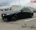 Черный Мазда 3, объемом двигателя 2.49 л и пробегом 114 тыс. км за 18500 $, фото 1 на Automoto.ua