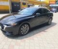 Черный Мазда 3, объемом двигателя 2.49 л и пробегом 82 тыс. км за 16850 $, фото 1 на Automoto.ua