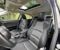 Чорний Мазда 3, об'ємом двигуна 2 л та пробігом 105 тис. км за 1995 $, фото 8 на Automoto.ua