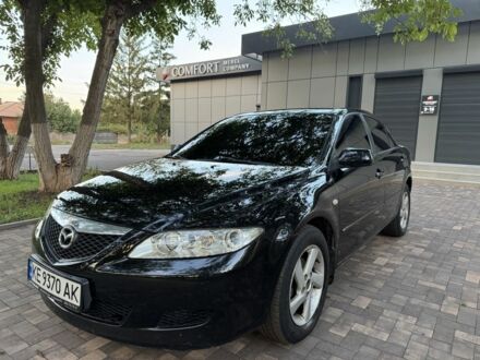 Черный Мазда 3, объемом двигателя 2 л и пробегом 230 тыс. км за 3950 $, фото 1 на Automoto.ua
