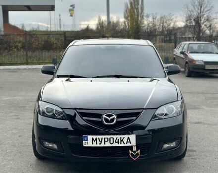Черный Мазда 3, объемом двигателя 2 л и пробегом 188 тыс. км за 5700 $, фото 1 на Automoto.ua