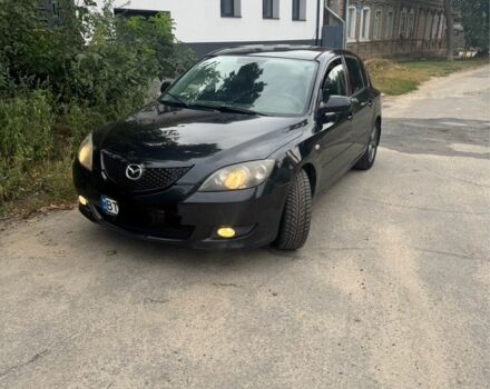 Чорний Мазда 3, об'ємом двигуна 1.6 л та пробігом 222 тис. км за 2998 $, фото 1 на Automoto.ua