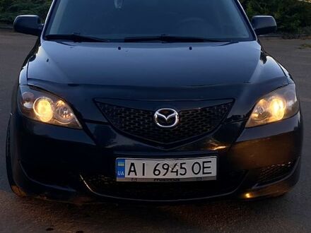 Черный Мазда 3, объемом двигателя 1.6 л и пробегом 237 тыс. км за 4100 $, фото 1 на Automoto.ua