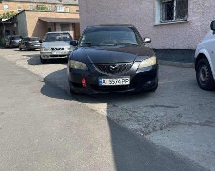Черный Мазда 3, объемом двигателя 1.6 л и пробегом 222 тыс. км за 3205 $, фото 1 на Automoto.ua