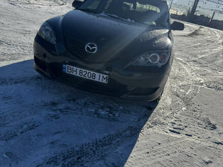 Черный Мазда 3, объемом двигателя 1.6 л и пробегом 193 тыс. км за 4000 $, фото 1 на Automoto.ua