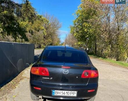 Черный Мазда 3, объемом двигателя 1.6 л и пробегом 250 тыс. км за 4000 $, фото 1 на Automoto.ua