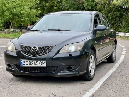 Черный Мазда 3, объемом двигателя 1.6 л и пробегом 242 тыс. км за 2501 $, фото 1 на Automoto.ua