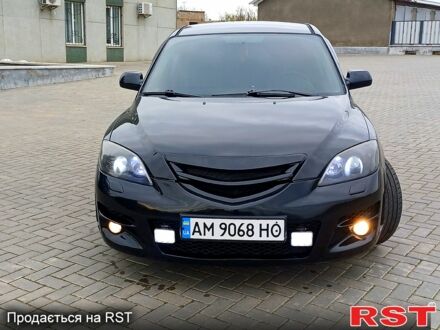 Черный Мазда 3, объемом двигателя 2 л и пробегом 327 тыс. км за 4000 $, фото 1 на Automoto.ua