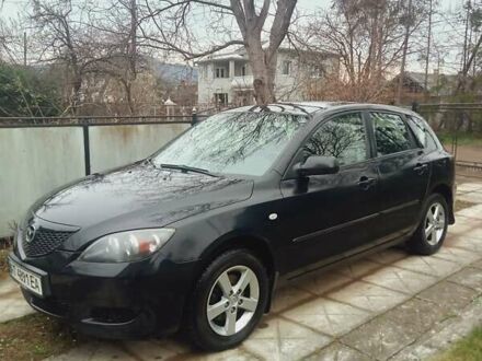 Черный Мазда 3, объемом двигателя 1.6 л и пробегом 145 тыс. км за 4500 $, фото 1 на Automoto.ua