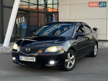 Черный Мазда 3, объемом двигателя 1.6 л и пробегом 308 тыс. км за 3990 $, фото 1 на Automoto.ua