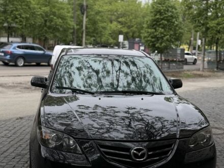 Чорний Мазда 3, об'ємом двигуна 2 л та пробігом 295 тис. км за 4399 $, фото 1 на Automoto.ua