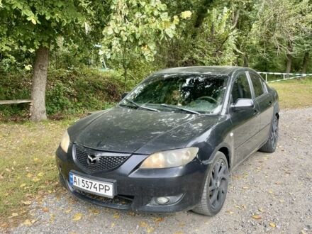 Черный Мазда 3, объемом двигателя 1.6 л и пробегом 222 тыс. км за 2800 $, фото 1 на Automoto.ua