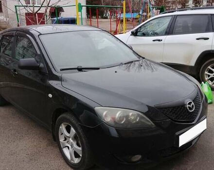 Черный Мазда 3, объемом двигателя 2 л и пробегом 182 тыс. км за 4800 $, фото 1 на Automoto.ua