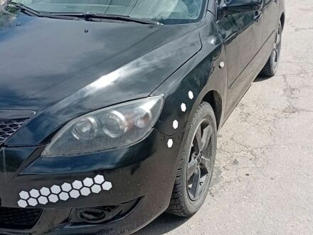 Чорний Мазда 3, об'ємом двигуна 1.56 л та пробігом 200 тис. км за 3000 $, фото 1 на Automoto.ua