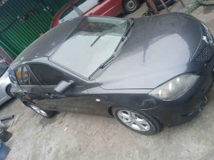 Черный Мазда 3, объемом двигателя 1.5 л и пробегом 240 тыс. км за 3300 $, фото 1 на Automoto.ua