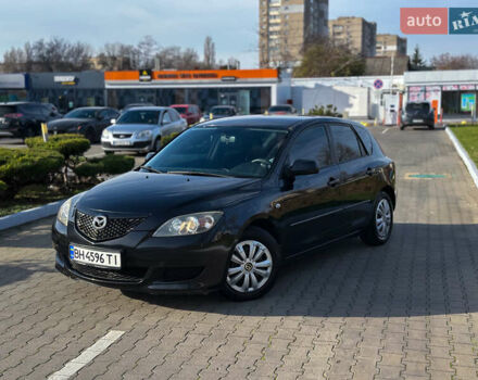 Чорний Мазда 3, об'ємом двигуна 1.35 л та пробігом 190 тис. км за 3799 $, фото 1 на Automoto.ua