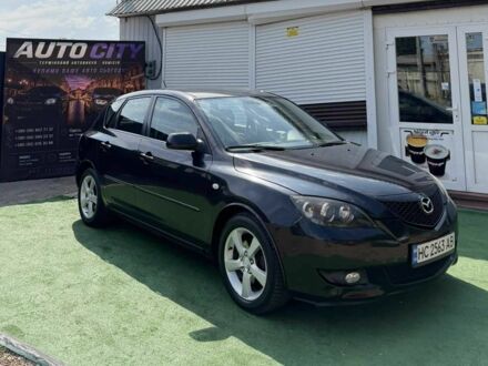 Чорний Мазда 3, об'ємом двигуна 1.6 л та пробігом 275 тис. км за 3302 $, фото 1 на Automoto.ua