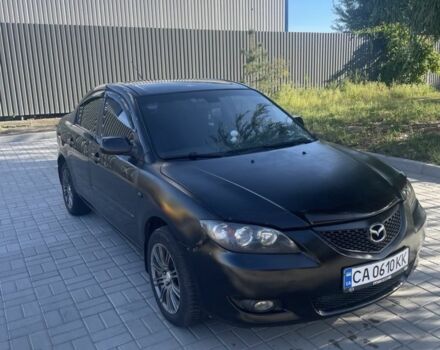 Черный Мазда 3, объемом двигателя 1.6 л и пробегом 292 тыс. км за 3100 $, фото 1 на Automoto.ua