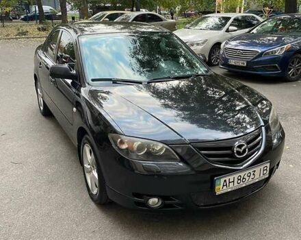 Черный Мазда 3, объемом двигателя 2 л и пробегом 174 тыс. км за 5300 $, фото 1 на Automoto.ua