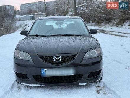 Черный Мазда 3, объемом двигателя 1.6 л и пробегом 257 тыс. км за 4000 $, фото 1 на Automoto.ua