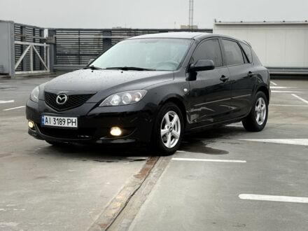 Черный Мазда 3, объемом двигателя 1.6 л и пробегом 300 тыс. км за 4000 $, фото 1 на Automoto.ua