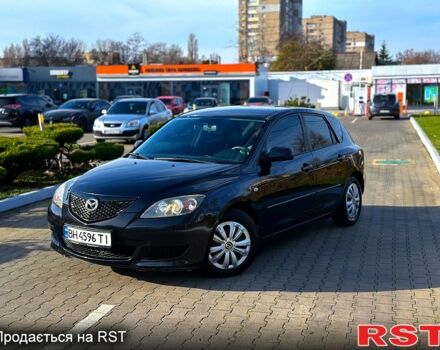 Черный Мазда 3, объемом двигателя 1.3 л и пробегом 200 тыс. км за 3799 $, фото 1 на Automoto.ua