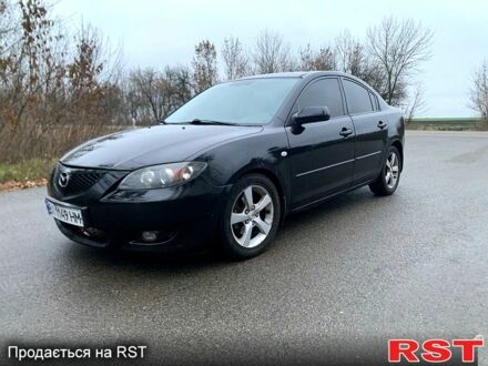 Чорний Мазда 3, об'ємом двигуна 1.6 л та пробігом 214 тис. км за 3750 $, фото 1 на Automoto.ua