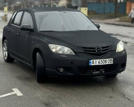 Черный Мазда 3, объемом двигателя 2 л и пробегом 350 тыс. км за 3000 $, фото 1 на Automoto.ua