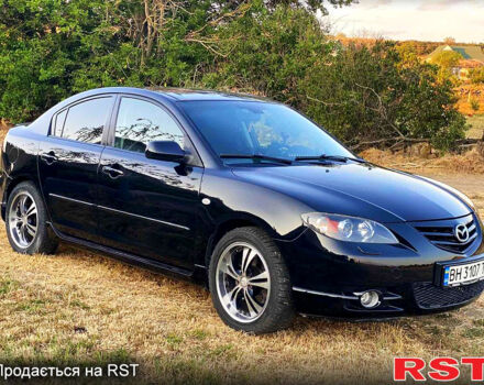 Черный Мазда 3, объемом двигателя 2 л и пробегом 204 тыс. км за 5400 $, фото 1 на Automoto.ua