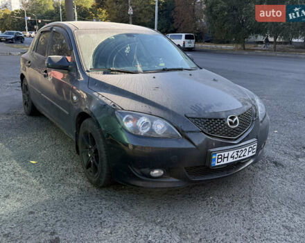 Черный Мазда 3, объемом двигателя 2 л и пробегом 173 тыс. км за 2999 $, фото 1 на Automoto.ua