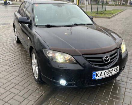 Черный Мазда 3, объемом двигателя 2 л и пробегом 184 тыс. км за 3700 $, фото 1 на Automoto.ua