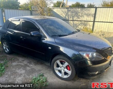 Черный Мазда 3, объемом двигателя 1.6 л и пробегом 200 тыс. км за 2200 $, фото 1 на Automoto.ua