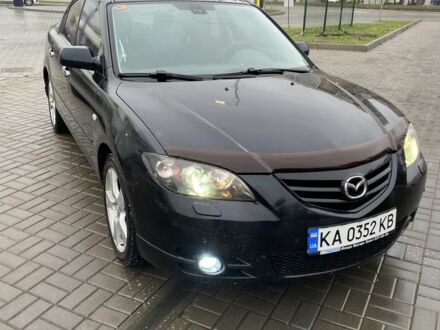 Черный Мазда 3, объемом двигателя 2 л и пробегом 184 тыс. км за 3699 $, фото 1 на Automoto.ua