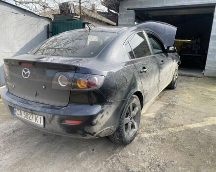 Черный Мазда 3, объемом двигателя 1.6 л и пробегом 240 тыс. км за 1700 $, фото 1 на Automoto.ua