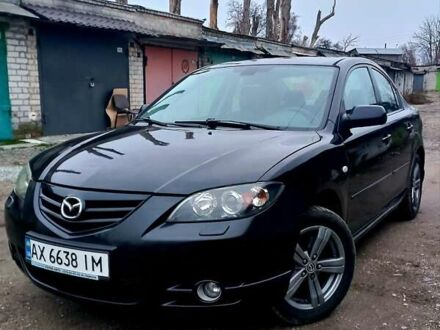 Черный Мазда 3, объемом двигателя 2 л и пробегом 245 тыс. км за 5200 $, фото 1 на Automoto.ua
