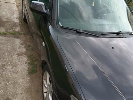 Черный Мазда 3, объемом двигателя 1.6 л и пробегом 356 тыс. км за 3000 $, фото 1 на Automoto.ua