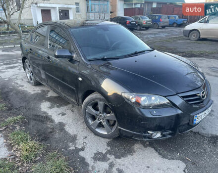 Черный Мазда 3, объемом двигателя 2 л и пробегом 260 тыс. км за 5100 $, фото 1 на Automoto.ua