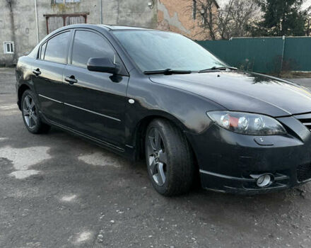 Черный Мазда 3, объемом двигателя 2 л и пробегом 260 тыс. км за 4950 $, фото 1 на Automoto.ua