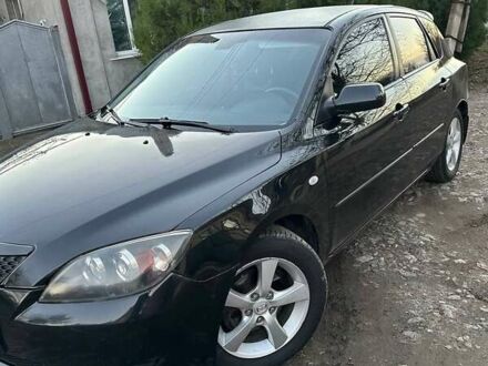 Черный Мазда 3, объемом двигателя 1.6 л и пробегом 199 тыс. км за 3700 $, фото 1 на Automoto.ua